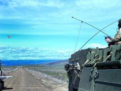 The Army tests an integrated mounted reconnaissance capability on a manned Stryker and an unmanned ground system called the Squad Maneuver Equipment Transport during the Joint Warfighter Assessment (JWA) 2019 in December. The Army is preparing Joint All-Domain Command and Control, or JADC2, capabilities to test at the next JWA in 2021. Credit: U.S. Army photo by Jack Bunja.