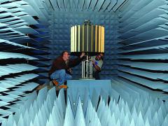 Two Tobyhanna Army Depot electronics experts set up a lightweight counter mortar radar system for rotation testing in an anechoic test chamber. This test removes the need for actual live-fire exercises and saves the Army tens of thousands of dollars for each system deployed to the field.