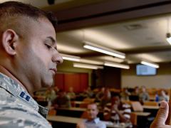 Capt. Liaquat Ali, USAF, deputy director of AF Connect, speaks to airmen about the Air Force Connect mobile app at the Air National Guard training and education center. Capt. Ali's team at the Pentagon rolled out the innovation, which allows both public and restricted-access communications on personal mobile devices. Photo by Master Sgt. Mike R. Smith, ANG
