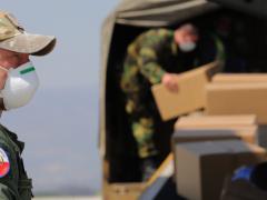 Czech military personnel load PPE supplies. Military personnel are conducting widespread testing in the Czech system of Smart Quarantine. Photo courtesy of NATO
