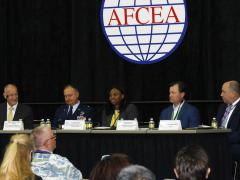 Panelists discussing spectrum challenges at TechNet Cyber 2022 are (l-r) Christopher Argo, Defense Spectrum Organization; Brig. Gen. Darrin Leleux, USAF; Vernita Harris, DISA; David Tremper, Office of the Assistant Secretary of Defense for Acquisition; and Brian Hermann, DISA.  Photo by Michael Carpenter