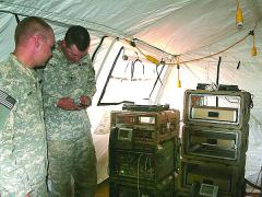Soldiers from the 86th Expeditionary Signal Battalion evaluated the new command post 4G long-term evolution (LTE)/Wi-Fi system (network stacks) at the U.S. Army’s NIE 14.2. (U.S. Army photo by Amy Walker, PEO C3T)