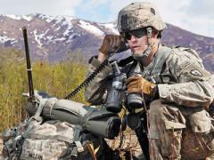 A forward observer reports during an exercise with the Advanced Field Artillery Tactical Data System. This system will benefit from the multidomain operation capabilities under development by the PEO IEWS. U.S. Army