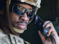 A U.S. Army sergeant communicates via radio on maneuvers in Germany. Army researchers are looking to incorporate new technologies into the service’s communications network to be able to maintain information supremacy in future combat operations.  U.S. Army photo