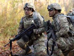 Soldiers with the 10th Mountain Division, Fort Drum, New York, survey an obstacle during an evaluation of the modular scalable vest generation II. The U.S. Army’s Army Research Laboratory (ARL) is working on developing personal and vehicle protective gear using new materials for harsh combat conditions. ARL photo
