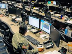 Soldiers at the U.S. Army Cyber Operation Center at Fort Gordon monitor networks for possible attacks by adversaries. The Army is striving to bring signal, cyber and military intelligence together in a partnership to meet challenges in the changing information environment.