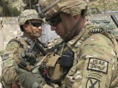 A U.S. Army captain uses a Nett Warrior end-user device in Afghanistan. A new approach to network training aims to teach soldiers what they need to know at their home station before deployment. 