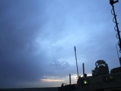 U.S. Marines in Afghanistan stand watch in a mine-resistant ambush-protected (MRAP) vehicle. The Joint Improvised-Threat Defeat Organization (JIDO) is considering factors such as security and reliability as it carefully weighs which types of data it will move to the cloud.