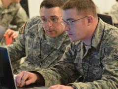 Two Vermont Army National Guard computer network defense team members participate in a 2014 Cyber Shield exercise. The command and control of defensive cyber operations now is centralized in the Defense Department’s Joint Force Headquarters (JFHQ) Department of Defense Information Network (DODIN).