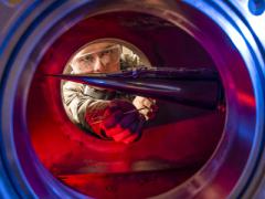 An Air Force Academy cadet peers into a wind tunnel used for measuring effects on hypersonic research vehicles. Development of new hypersonic craft is speeding up, but considerable research remains to overcome some technological challenges. U.S. Air Force photo