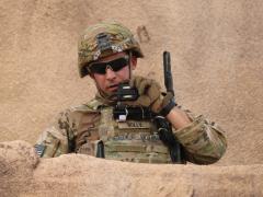 A U.S. Army infantryman radios his situation report during an exercise. Future defense communications systems are likely to be smaller and more comprehensive as the military and industry collaborate on new information technology capabilities that help the warfighter in the battlespace. Credit: Capt. Lindsay Roman, USA