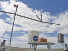 The Lightweight Surface Manipulator System (LSMS), a surface version of TALISMAN, would help offload lunar landers and construct facilities on the Moon. NASA