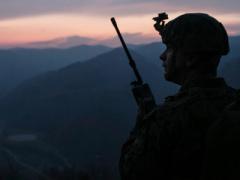 A U.S. Marine staff sergeant radios pilots during an exercise in South Korea. Marine Expeditionary Forces (MEFs) often must tap assets of other services when deployed—a situation the Corps is trying to eliminate.