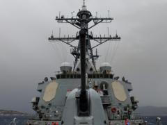 The USS Porter transits the Strait of Messina in the Mediterranean. The Navy is increasing its emphasis on information warfare (IW) as it integrates the capability with air, surface and subsurface operations.