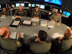 Personnel with the 618th Tanker Airlift Control Center coordinate global operations from Scott Air Force Base, Illinois. The U.S. Transportation Command (TRANSCOM) finds itself amid battles in cyberspace as intrusions on networks owned by its commercial partners pose a significant threat to U.S. military operations.