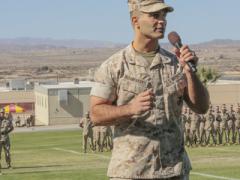 Lt. Col. Speros C. Koumparakis, USMC, commanding officer of the communication training battalion (CTB) in the Marine Corps Communication-Electronics School (MCCES), addresses the audience during the CTB’s activation ceremony in March. The CTB, along with the air control training squadron (ACTS), have been consolidated under the MCCES at a single facility in Twentynine Palms, California.