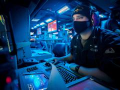 A sonar technician simulates counterfire during an antisubmarine warfare drill aboard the Arleigh Burke-class guided missile destroyer USS John S. McCain. The Navy is exploring advances in machine learning and artificial intelligence to deal with the rapidly increasing amount of sensor data flooding naval intelligence systems.  U.S. Navy photo