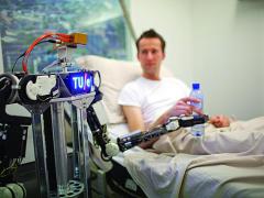 Researchers working on the RoboEarth project demonstrate a robot’s ability to learn and cooperate with other robotic systems to serve medical patients. The project uses cloud computing to teach robots to perform tasks that seem intuitive for humans but are a challenge for robots.