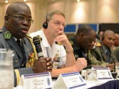 Col. Leon-Rodance Ndinga from the Republic of Congo comments during a tabletop exercise at AE 2015 in Botswana. AE is an annual 10-day communications seminar designed to increase interoperability between partner nations to support United Nations and African Union peacekeeping, disaster response and humanitarian assistance missions.