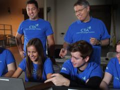 Led by Sandia National Laboratories instructors (top row, from l) C.W. Perr and Steve Hurd, students (bottom row, from l) Anuj Kak, Samantha MacIlwaine, Makena Harmon and Evan Laufer participate in hands-on training exercises as part of Sandia’s annual summer Cyber Technologies Academy.
