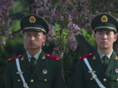 People’s Liberation Army (PLA) personnel stand in front of the Great Hall of the People in Beijing. Long-standing traditions, beliefs and doctrine underpin many PLA activities in cyberspace.