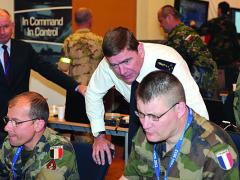 Gen. Stephane Abrial, FRA, Supreme Allied Commander Transformation (ACT), observes part of the Coalition Warrior Interoperability Exercise (CWIX) 12 held in June. The exercise helped validate the effectiveness of the new Tactical Edge Data Solutions (TEDS) joint capability technology demonstration (JCTD).