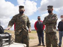 A U.S. Marine Corps lieutenant colonel with the Defense Information Systems Agency (DISA) explains a Cloud Layered Obfuscation Application Kit (CLOAK) to the commanding officer for I Marine Expeditionary Force (I MEF) Information Group. CLOAK uses commercial cloud computing resources to improve I MEF connectivity. U.S. Marine Corps photo