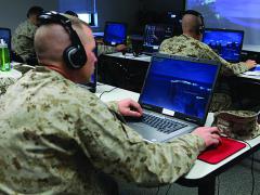 U.S. Marines communicate digitally over a network. The Next Generation Enterprise Network, or NGEN, will take a new approach to networking yet evolve from the existing Navy Marine Corps Intranet.