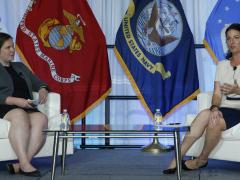 Michelle Lee, director, Threat Intelligence at Lumen Technologies (l) and Caroline Kuharske, acting chief data officer, Defense Information Systems Agency, converse during a sesison at AFCEA’s TechNet Cyber 2022. Photo by Michael Carpenter