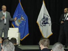 Stephen Wallace, DISA’s chief technology officer and director of the agency’s Emerging Technologies Directorate (l), and Jason Prow, partner, U.S. federal intelligence connected operations and automation leader, IBM, speak at TechNet Cyber in Baltimore. Photo by Michael Carpenter