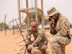 Army Staff Sgt. Andrew Kirchoff, left, and Staff Sgt. Roberto Carlos Ramirez operate a satellite communication antenna in Kaedi, Mauritania, February 2020, during Flintlock. The modern warfighter must remain light and agile and enjoy ease of communication, highlighting the necessity for and relevance of devices such as the Global Rapid Response Information Package. Army Cpl. Kevin Payne