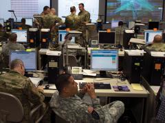 As part of the nine-day Cyber Guard exercise, participants work through a training scenario. Credit: Navy Petty Officer 2nd Class Jesse A. Hyatt, USN