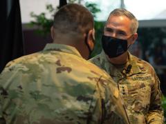 Lt. Gen. Stephen Whiting, Space Operations Command commander, shown inducting a service member into the U.S. Space Force, discussed cyber defense advancements at the 2022 Rocky Mountain Cyberspace Symposium. Credit: U.S. Space Force photo by Staff Sgt. Kirsten Brandes