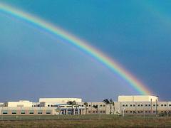 A double rainbow looms over the NSA/CSS Center in Oahu, Hawaii. The building is named after Capt. Joseph T. Rochefort, USN, whose team provided the key intelligence that helped win the 1942 Battle of Midway. The agency is looking to industry and academia for innovations vital to its changing mission. Credit: NSA/CSS