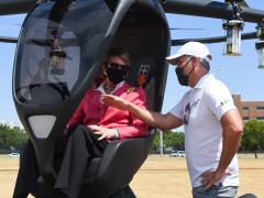 LIFT Aircraft CEO Matthew Chasen shows Secretary of the Air Force Barbara Barrett the controls of the company's Hexa electric vertical takeoff and landing (eVTOL) aircraft at Camp Mabry, Texas, on August 20. The demonstration, hosted by the Texas Air National Guard, was the first in a series that the service's Agility Prime will hold this fall as it strives to field eVTOL aircraft by 2023. Credit: Air National Guard photo by Staff. Sgt. Sean Kornegay