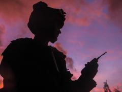 A Marine uses a radio during a field exercise at Camp Hansen in Okinawa, Japan, in 2017. A resilient network is a key component for the Joint All-Domain Command and Control (JADC2) concept. The Pentagon is developing a strategy to enable JADC2. Credit: Marine Corps photo by Cpl. Carl King