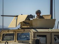 A U.S. Army soldier provides security during the Advanced Battle Management System (ABMS) exercise at Nellis Air Force Base, Nevada, Sept. 3, 2020. Staged at multiple military sites, ABMS simulated an attack on the national infrastructure testing the U.S. Department of Defense’s Joint All Domain Command and Control (JADC2) which allowed for a fast-coordinated response.  U.S. Air Force photo by Airman 1st Class Dwane R. Young