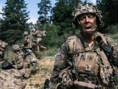 A U.S. Army soldier shouts orders as his unit prepares to assault an objective during exercise Saber Junction in Germany this year. NATO faces its own organizational challenges as it strives to increase the resiliency and effectiveness of its logistics in the face of a newly emerging threat picture. Credit: NATO