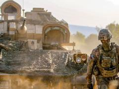 A soldier guides an M2A3 Bradley Fighting Vehicle during an exercise at Novo Selo Training Area, Bulgaria, in August 2018. On December 18, 2020, Army officials released a request for proposals for the Optionally Manned Fighting Vehicle. Credit: U.S. Army photo