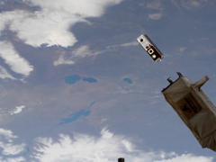 A DARPA cubesat placed into orbit from the International Space Station contains an experiment in which microelectronic mechanical systems (MEMS) change the mirror shape of an optical system to generate high-quality imagery. Space is just one area in which the agency is boosting its research to meet new challenges. Credit: NASA photo