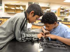 McKinley Middle School students design and build the model car they will race in the New Mexico Electric Car Challenge on November 22 at Albuquerque’s Highland High School.