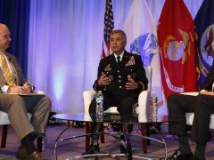 From l-r, Francis Rose of Government Matters moderates a fireside chat with Gen. Paul Nakasone, USA, director of the NSA and commander of U.S. Cyber Command, and Dana Deasy, Defense Department CIO, at TechNet Cyber. Photo by Michael Carpenter