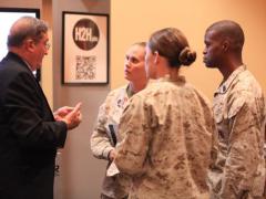 Marines speak with a potential employer a Hiring Our Heroes Veterans Event hosted by the U.S. Chamber of Commerce at the Pacific Views South Mesa Club at Camp Pendleton, Calif. in September 2012.