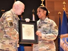 Lt. Col. Natashia Coleman (c) assumes the role as product lead for the Unified Network Capabilities and Integration (UNCI) office created in January. The UNCI office is consolidating tactical network integration efforts to support future capabilities, including the pursuit of Sustainment Tactical Network. Credit: U.S. Army photo by Lynn Harkins, PM TN Graphics