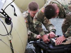 Program Executive Office Command Control Communications-Tactical (PEO C3T), through its Program Manager Tactical Network, equips a brigade combat team in the 82nd Airborne Division with the an inflatable satellite communications system known as T2C2. Brig. Gen. Robert Collins, USA, takes over as the new PEO C3T on June 1 and says he will continue the key efforts to modernize the service's tactical communications. Credit: U.S. Army photo by Amy Walker, PEO C3T