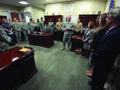 Brig. Gen. John Baker, USA, J-6, U.S. Central Command (CENTCOM), addresses his staff at a ceremony honoring Col. Edward Cobb, (decesased) USA, former J-6 of the precursor to CENTCOM.
