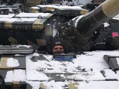 A Ukrainian tank operator peers out from his T-64 near Kharkiv. Russia has sorely underestimated Ukraine's resistance to its invasion, leaving President Vladimir Putin with little to no options for closing out the war. Credit: Seneline/Shutterstock