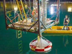 Sandia National Laboratories research engineers Ryan Coe and Giorgio Bacelli are collecting new information to optimize wave energy converter testing. (Photo courtesy of Sandia National Laboratories)