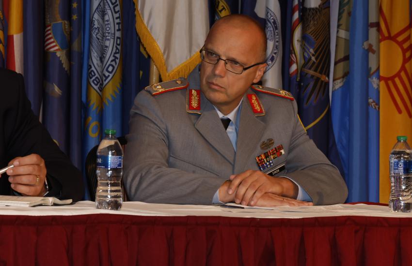 Brig. Gen. Rainer Simon, commandant at the German Army IT School speaks during a C2 panel. Photo By: Michael Carpenter.