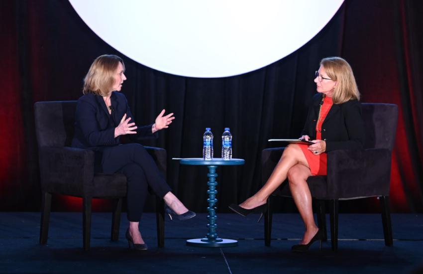 Kathleen Hicks, deputy secretary of defense (l), speaks to Letitia Long, INSA chair of the board, during the Intelligence and National Security Summit. Credit: Herman Farrer